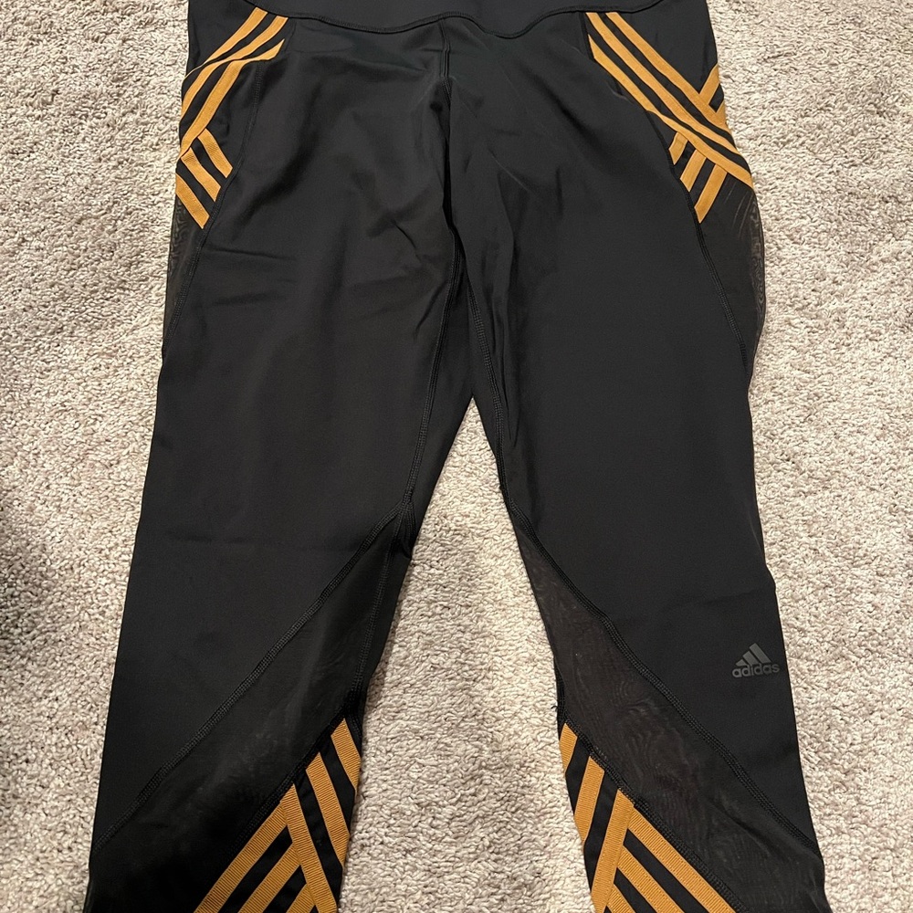 Adidas IVYPARK Black and Gold Striped Track Pants